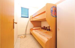 Postel nebo postele na pokoji v ubytování Holiday Home Kakma V