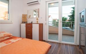 Postel nebo postele na pokoji v ubytování Holiday Home Kakma V