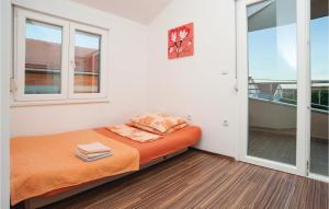 Postel nebo postele na pokoji v ubytování Holiday Home Kakma V