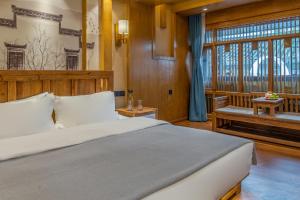 夕露古城中心店 XILU INN NANXI - Ancient City Center Branch客房内的一张或多张床位