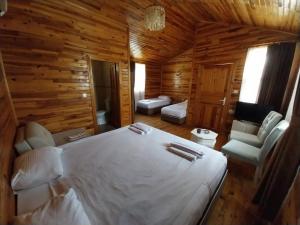 Postel nebo postele na pokoji v ubytování Elamir Resort Hotel