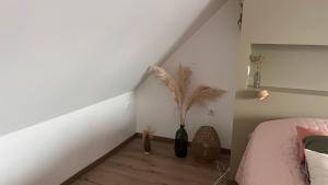 Postel nebo postele na pokoji v ubytování la laiterie