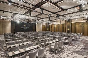 a large room with tables and chairs in it at InterContinental Taichung by IHG in Taichung