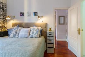 Postel nebo postele na pokoji v ubytování Málaga Center Old Town - Happy Rentals