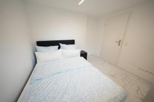 Postel nebo postele na pokoji v ubytování Stilvolle 3-Zimmer-Oase