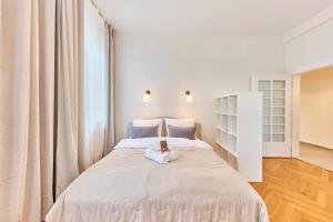 a bedroom with a bed with a book on it at Lisa 3, Guestroom-WG-Zimmer Eggert in Pforzheim