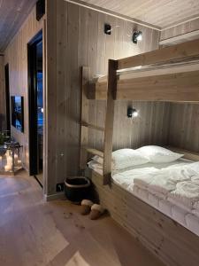 Postel nebo postele na pokoji v ubytování Helt ny leilighet ski in- ski out i Hemsedal