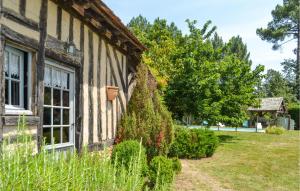 an old house with a garden next to it at Nice Home In Église-Neuve-D'issac in Saint-Jean-dʼEyraud +13 photos