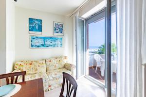 A seating area at Appartamento Bellariva B2 - MyHo Casa
