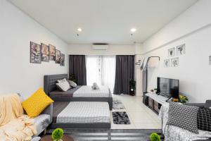 Ένα ή περισσότερα κρεβάτια σε δωμάτιο στο Twin Towers Suites - 7mins walking to KLCC +47 φωτογραφίες