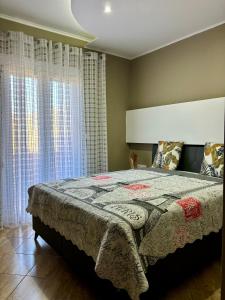 A bed or beds in a room at Manti