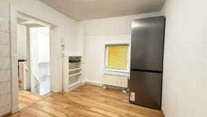 Kuchyň nebo kuchyňský kout v ubytování Apartment in Bad Bramstedt ruhige Lage im Haus zur Alleinnutzung mit Parkplatz & WLAN