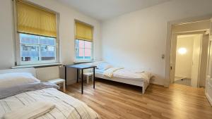 Postel nebo postele na pokoji v ubytování Apartment in Bad Bramstedt ruhige Lage im Haus zur Alleinnutzung mit Parkplatz & WLAN