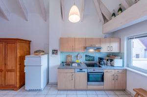 Kuchyň nebo kuchyňský kout v ubytování Altstadt-Traum - gemütliche Maisonette- Ferienwohnung in der Warener Altstadt