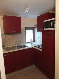 Kuchyň nebo kuchyňský kout v ubytování Maison Gaudenzio