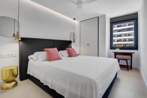 Posteľ alebo postele v izbe v ubytovaní La Nogalera, piscina, playa y ocio + 11 fotografií