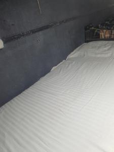 Postel nebo postele na pokoji v ubytování Bapuji Dormitory Hostel Mumbai