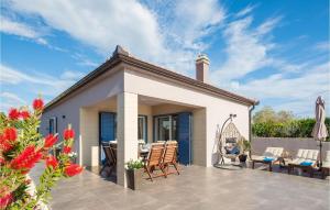 a villa with a patio and a house at Villa Karla Nin in Nin +25 photos