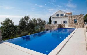 Πισίνα στο ή κοντά στο Villa Peleope