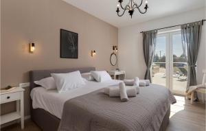 Ένα ή περισσότερα κρεβάτια σε δωμάτιο στο Villa Muralis