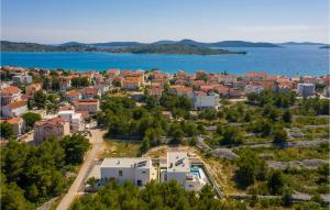 an aerial view of a small town by the water at Villa Quentin in Vodice