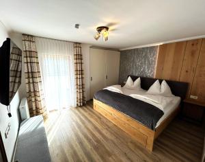 Postel nebo postele na pokoji v ubytování Haus Wegscheider