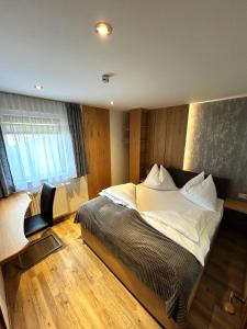Postel nebo postele na pokoji v ubytování Haus Wegscheider