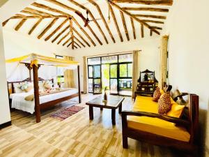 Postel nebo postele na pokoji v ubytování Z-Breeze Zanzibar