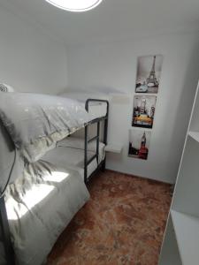 Postel nebo postele na pokoji v ubytování Apartamentos Lucia Algodonales