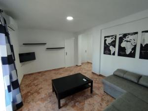 TV a/nebo společenská místnost v ubytování Apartamentos Lucia Algodonales
