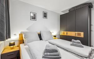 Postel nebo postele na pokoji v ubytování Gebirgsresort Winterberg