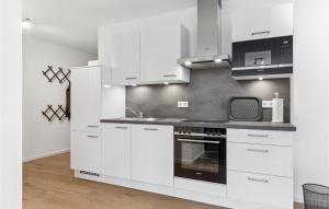 Kuchyň nebo kuchyňský kout v ubytování Gebirgsresort Winterberg