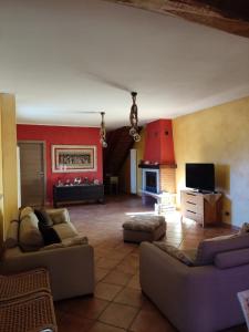 TV a/nebo společenská místnost v ubytování CASA GENESA