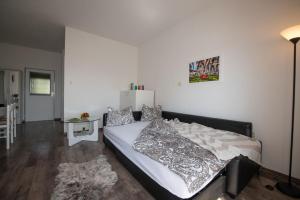 Postel nebo postele na pokoji v ubytování Apartment Miriam