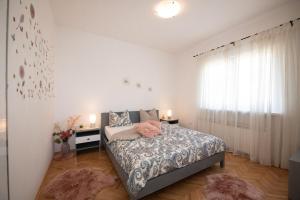 Postel nebo postele na pokoji v ubytování Apartment Miriam