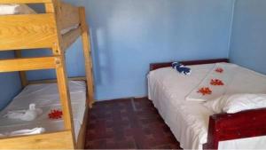 Postel nebo postele na pokoji v ubytování Mana Lagoon Backpackers