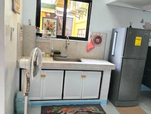 Kuchyň nebo kuchyňský kout v ubytování Go-Vitug Apartell, 2-8 pax, AC, Netflix, Parking