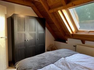 En eller flere senge i et værelse på Ferienappartements Thomas Heindl