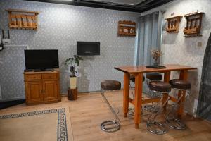 TV a/nebo společenská místnost v ubytování Apartmán