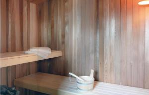 a small sauna with a sink and a towel at 3 Bedroom Lovely Home In Dagebüll in Dagebüll