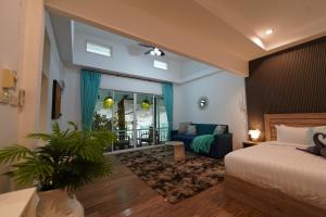 Postel nebo postele na pokoji v ubytování Tropical Oasis Aoyon Beach House + 37 fotografií