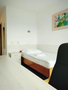 Posteľ alebo postele v izbe v ubytovaní Sanatorium Równica