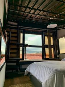 Voodi või voodid majutusasutuse INLOFT Quindío toas