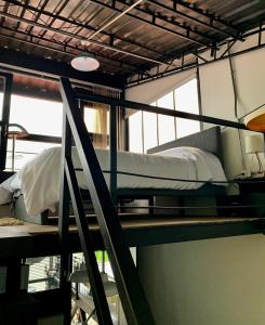Voodi või voodid majutusasutuse INLOFT Quindío toas