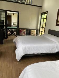 Voodi või voodid majutusasutuse INLOFT Quindío toas
