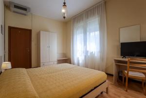 TV a/nebo společenská místnost v ubytování Hotel B&B Risorta