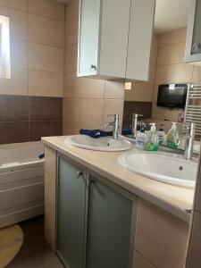Η κουζίνα ή μικρή κουζίνα στο Alpin Apartament