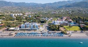 an aerial view of the resort and the water at Elite City Resort in Kalamata