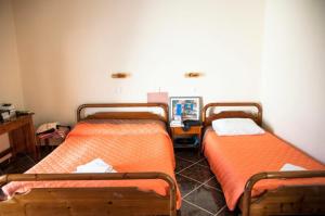 Postel nebo postele na pokoji v ubytování Eleni Hotel