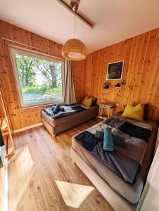 Μια τηλεόραση ή/και κέντρο ψυχαγωγίας στο Domki Zalesie